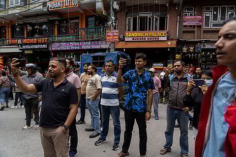 People watch pride parade in Kathmandu